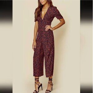 Blue Life Black and Red Animal Print zipper front low cut jumpsuit. S